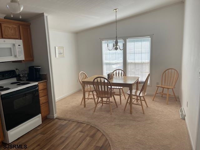 94 Center Ocean View, NJ 08230 - Photo 3 of 12 a view of a a dining room with furniture window and outside view