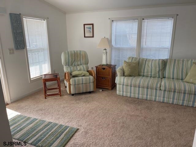 94 Center Ocean View, NJ 08230 - Photo 4 of 12 a living room with furniture and a window