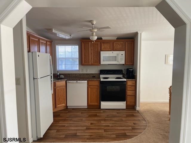 94 Center Ocean View, NJ 08230 - Photo 5 of 12 a kitchen with stainless steel appliances granite countertop a refrigerator a stove a sink and a microwave