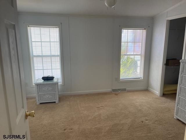 94 Center Ocean View, NJ 08230 - Photo 7 of 12 an empty room with windows