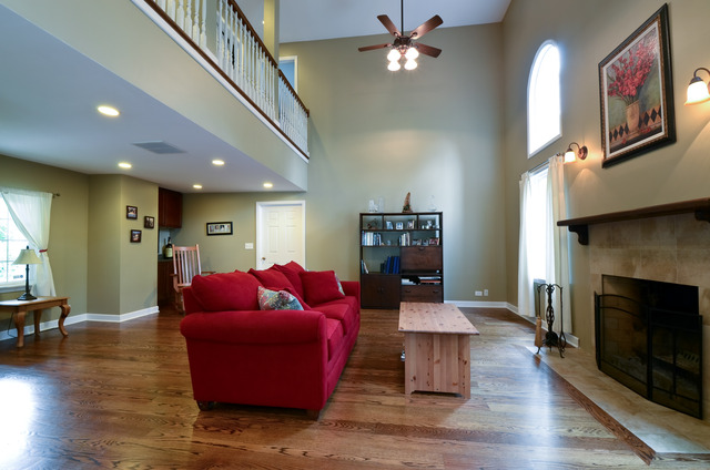 2347 Winnetka Road Glenview, IL 60025 - Photo 8 of 15 a living room with furniture fireplace and wooden floor