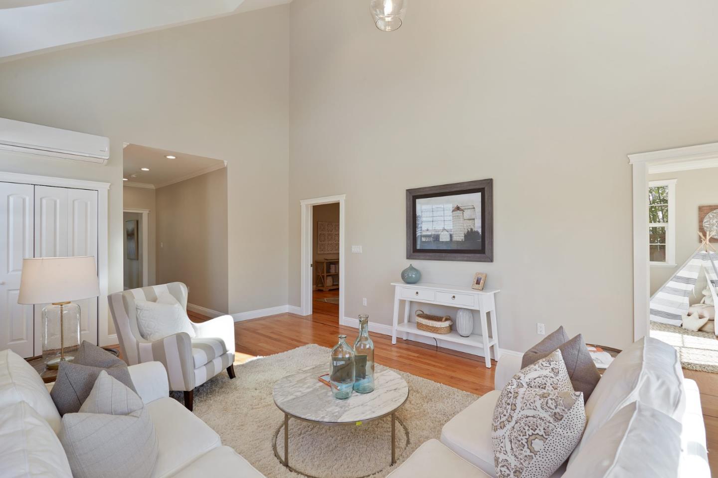 29 Bloomfield Road Burlingame, CA 94010 - Photo 22 of 54 a living room with furniture and a table