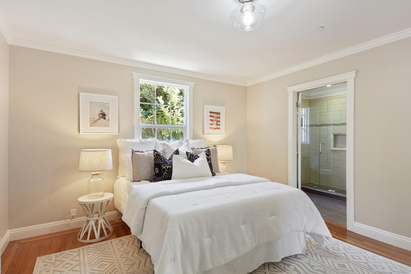 29 Bloomfield Road Burlingame, CA 94010 - Photo 35 of 54 a bedroom with a bed and wooden floor