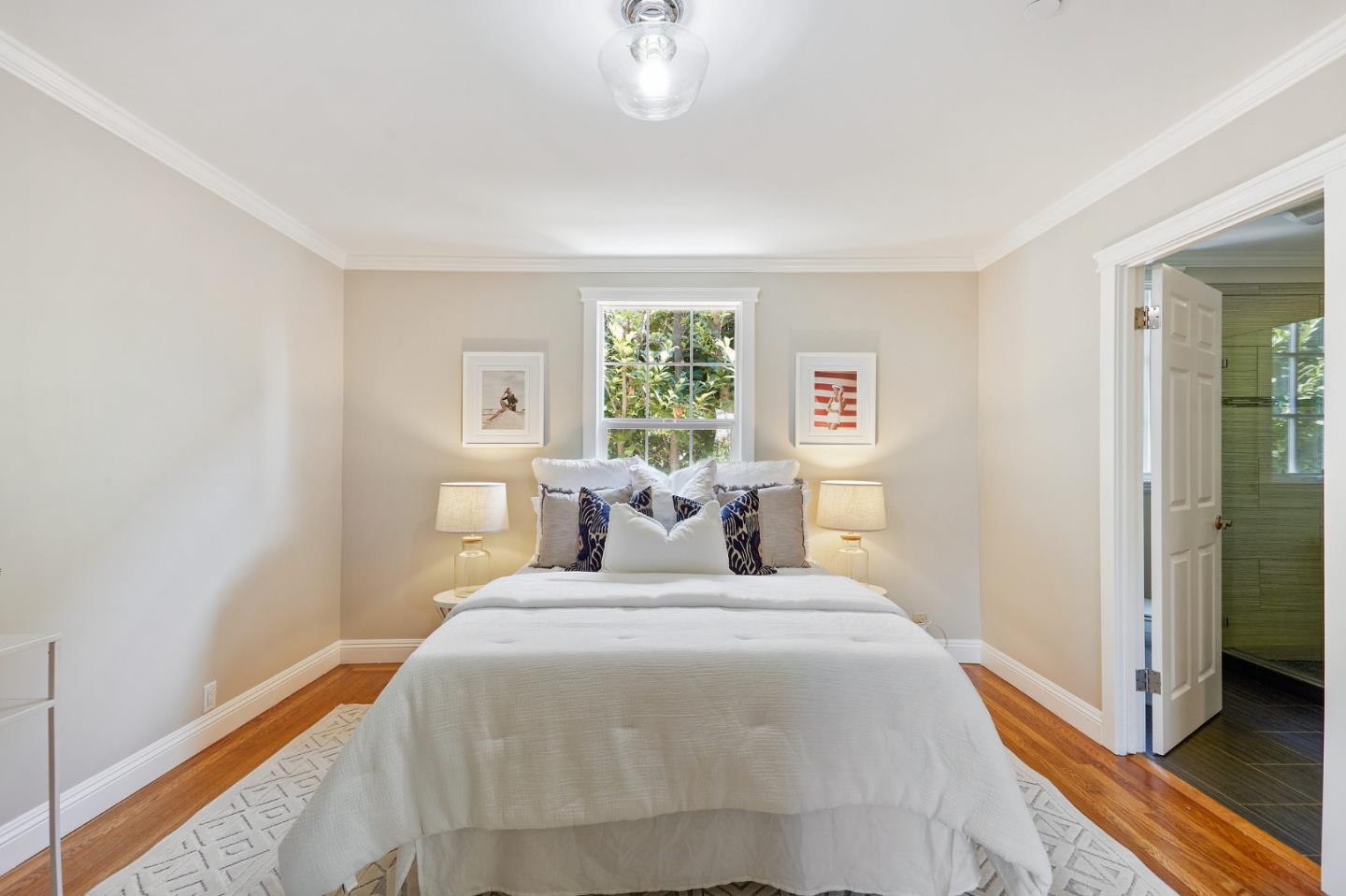 29 Bloomfield Road Burlingame, CA 94010 - Photo 36 of 54 a bed room with a bed and a chandelier