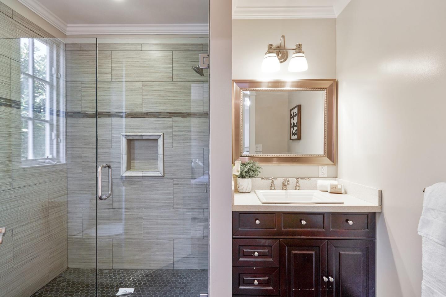 29 Bloomfield Road Burlingame, CA 94010 - Photo 37 of 54 a bathroom with a sink and a mirror