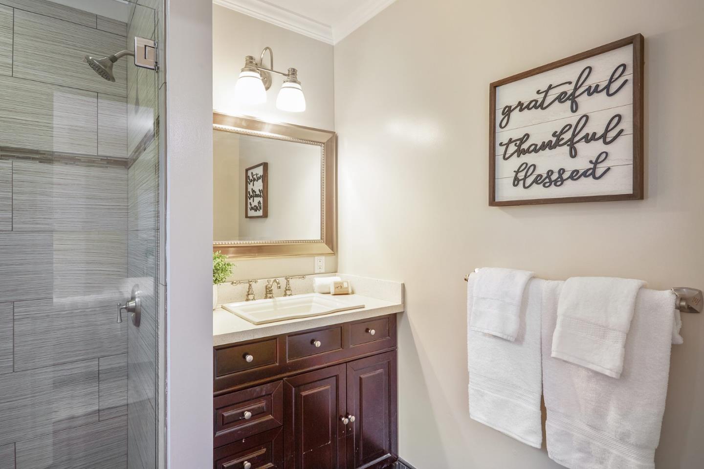 29 Bloomfield Road Burlingame, CA 94010 - Photo 38 of 54 a bathroom with a sink and a mirror