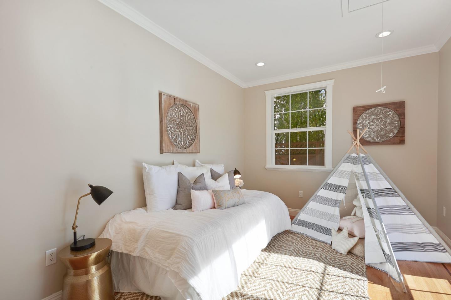 29 Bloomfield Road Burlingame, CA 94010 - Photo 44 of 54 a bedroom with a bed and a window