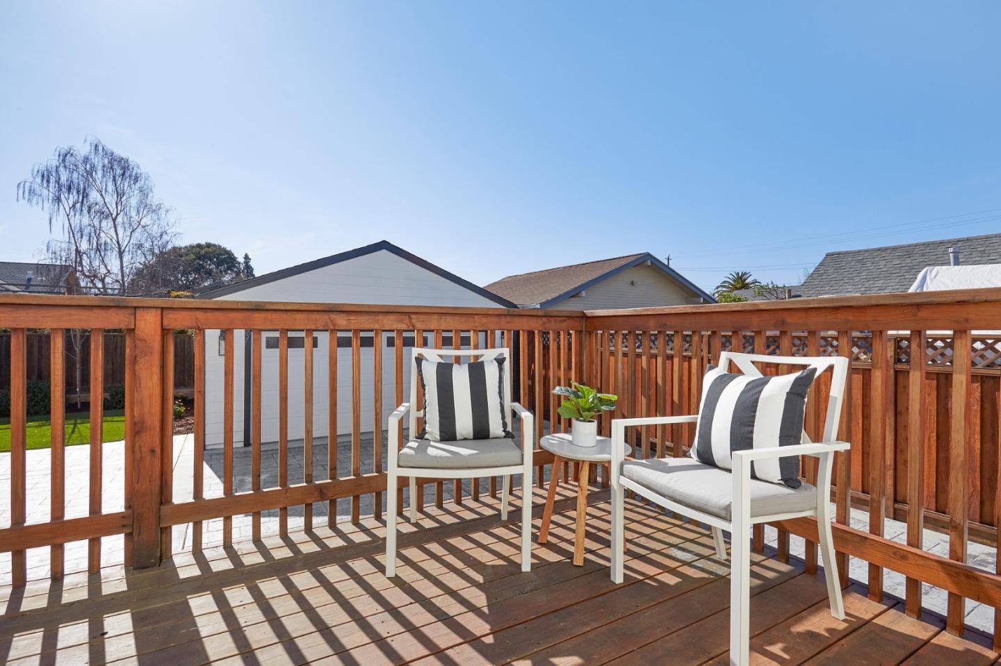 29 Bloomfield Road Burlingame, CA 94010 - Photo 48 of 54 a roof deck with couches and wooden floor