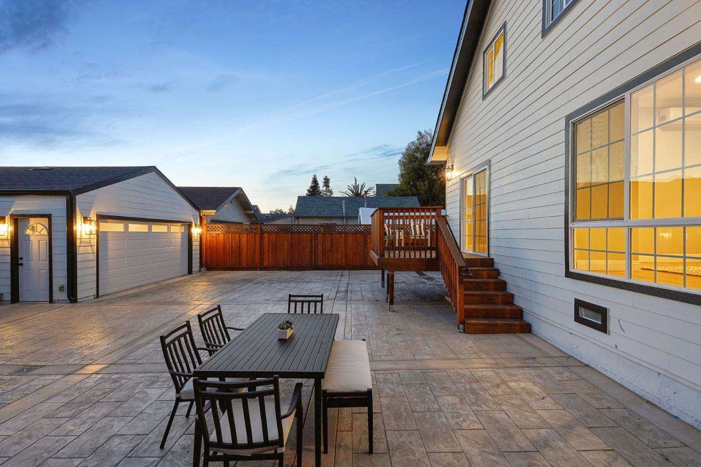 29 Bloomfield Road Burlingame, CA 94010 - Photo 51 of 54 a backyard of a house with barbeque oven table and chairs