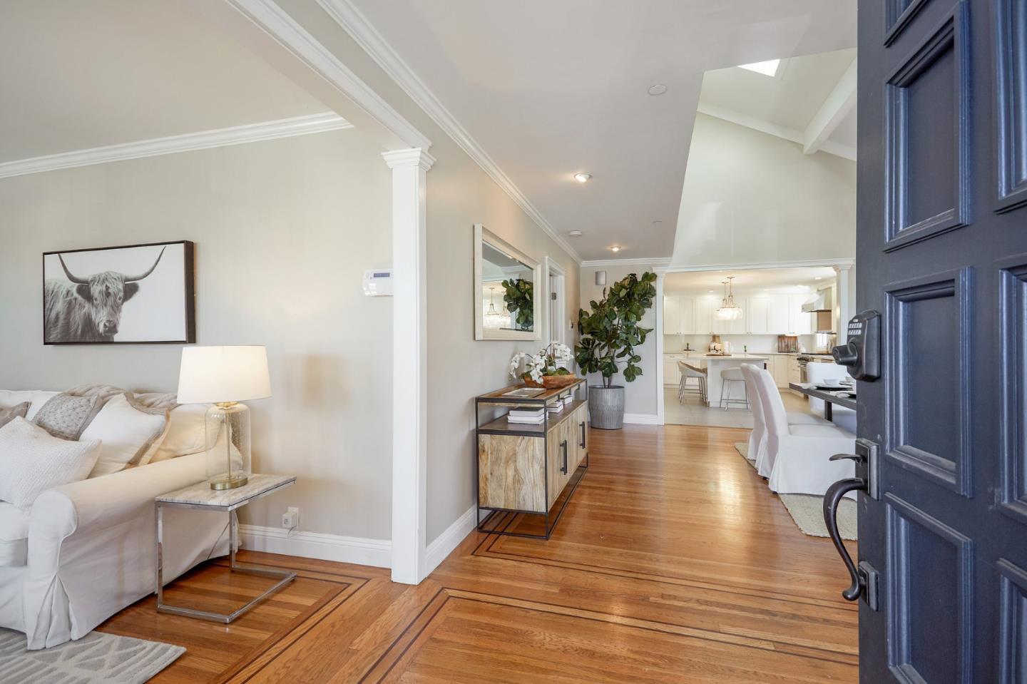 29 Bloomfield Road Burlingame, CA 94010 - Photo 6 of 54 a view of a living room kitchen and a wooden floor