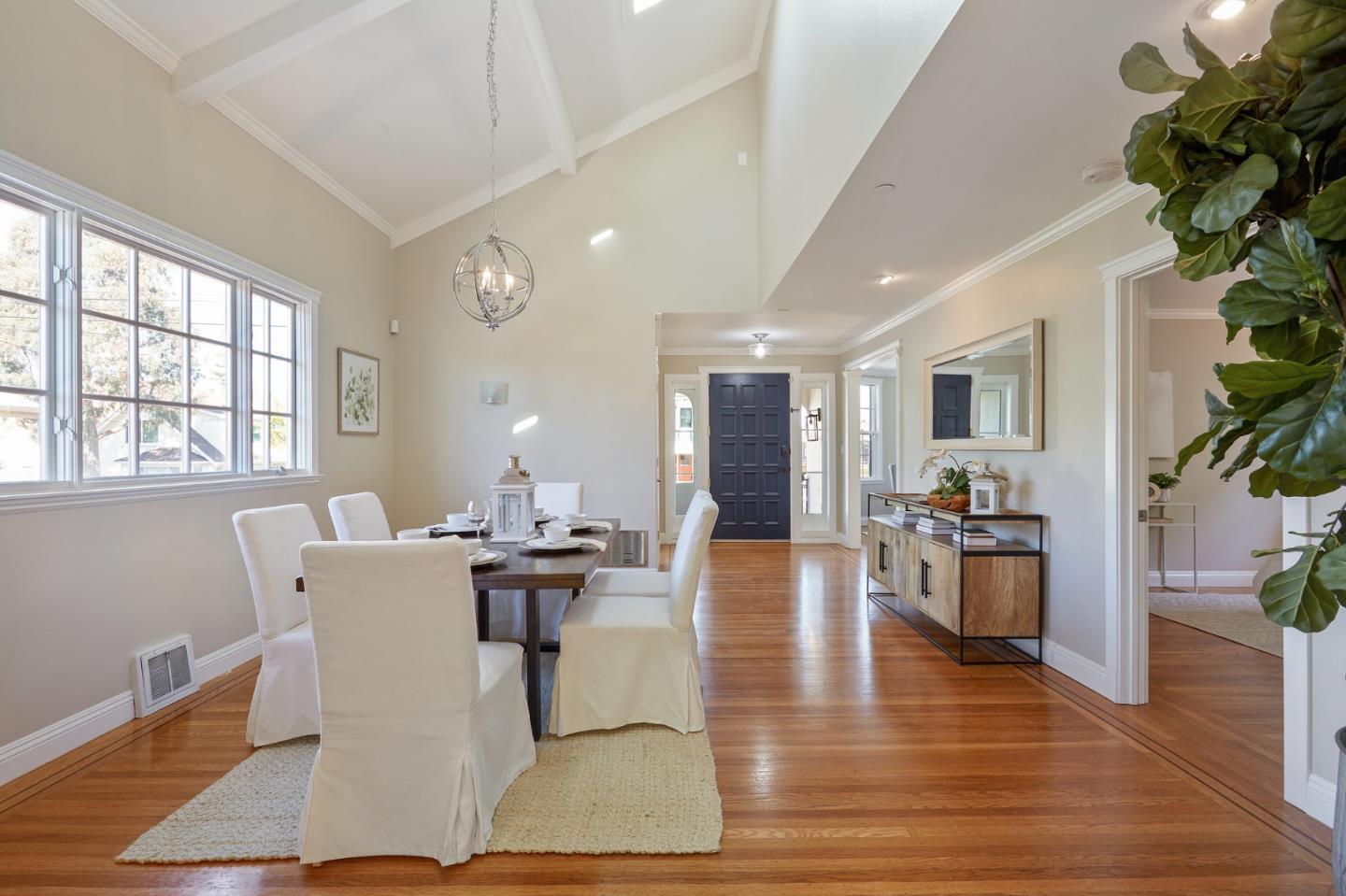 29 Bloomfield Road Burlingame, CA 94010 - Photo 9 of 54 a living room with fireplace furniture and a wooden floor