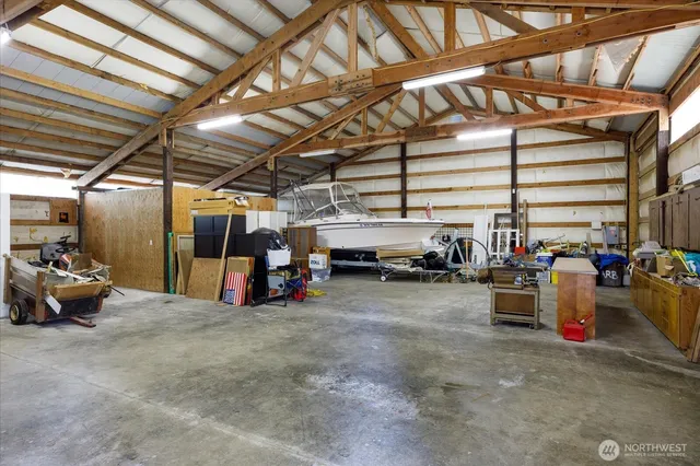 a view of parking garage with cars