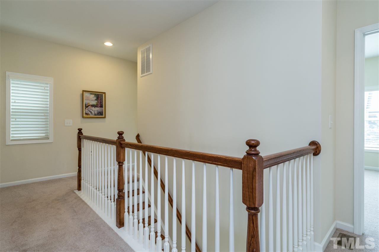 5630 Wade Park Boulevard Raleigh, NC 27607 - Photo 16 of 30 Upstairs open railing adds to the already light filled home!