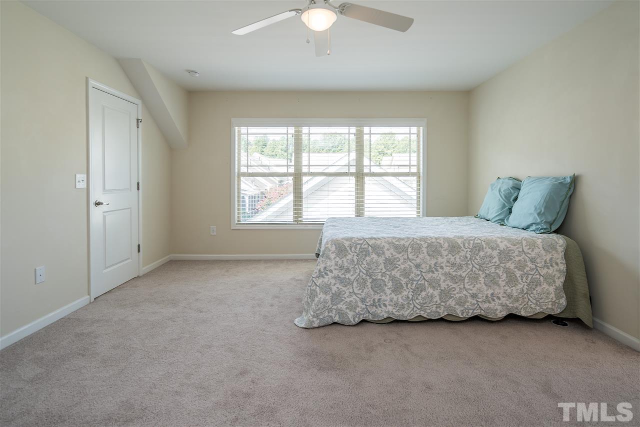 5630 Wade Park Boulevard Raleigh, NC 27607 - Photo 26 of 30 Expansive windows, sunlight, ceiling fan, closet, bathroom, what more could you want for this future office, guest room, gym, you name it!