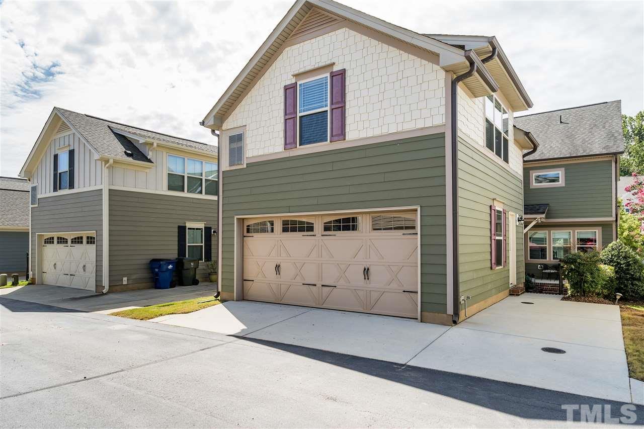 5630 Wade Park Boulevard Raleigh, NC 27607 - Photo 29 of 30 Rear alley view of your new home! Two car garage with parking pad and suite above the garage!