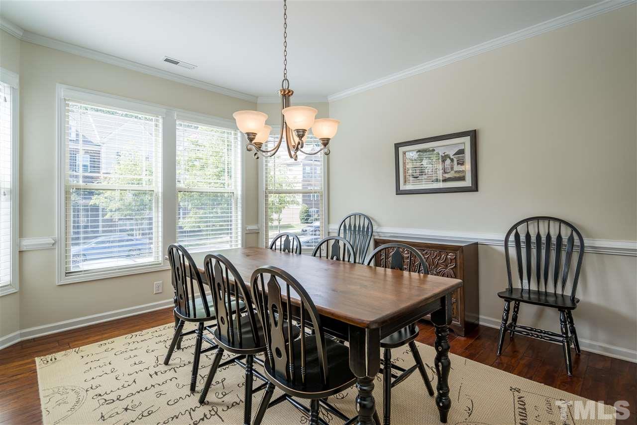 5630 Wade Park Boulevard Raleigh, NC 27607 - Photo 5 of 30 Plenty of room in this dining room for great parties, holidays and meals shared with friends!