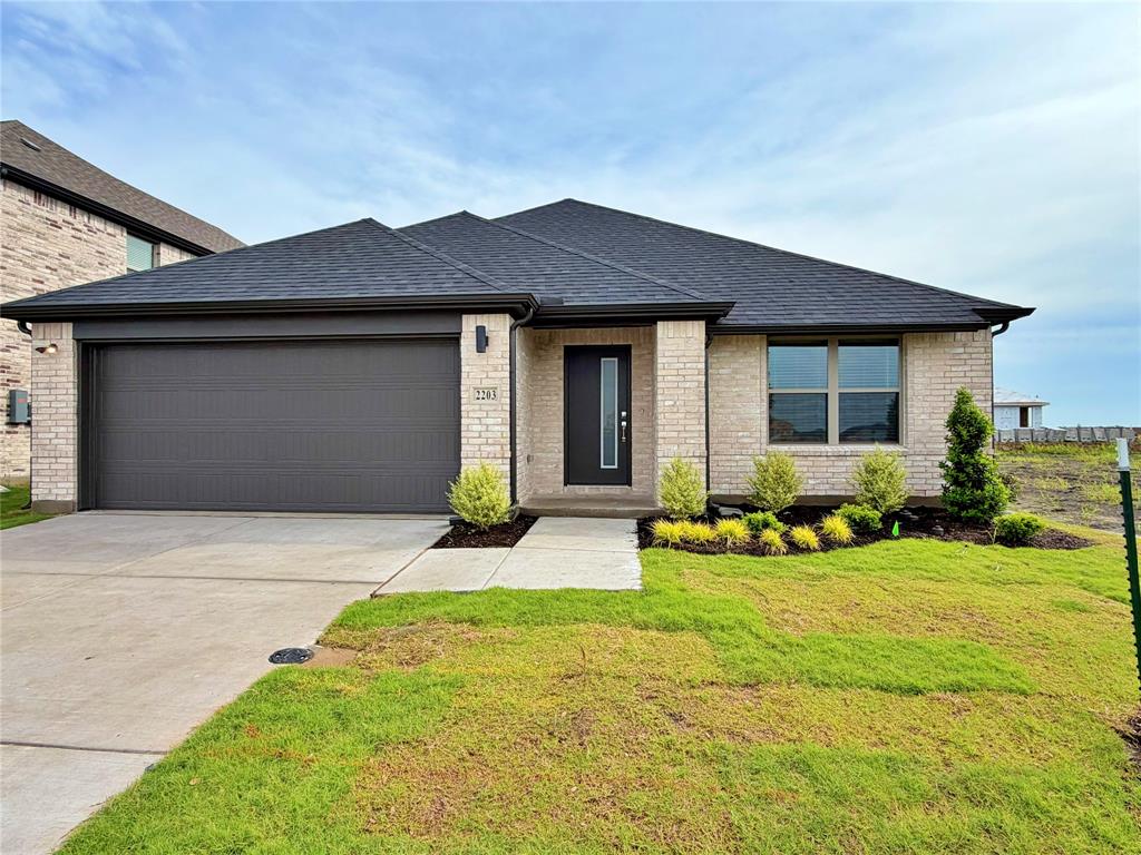 2203 Heatwave Lane Princeton, TX 75407 - Photo 1 of 32 a front view of house with yard and green space