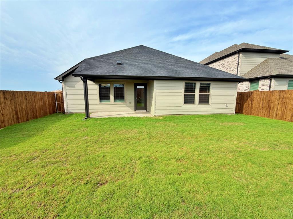 2203 Heatwave Lane Princeton, TX 75407 - Photo 2 of 32 a front view of house with yard and trees in the background