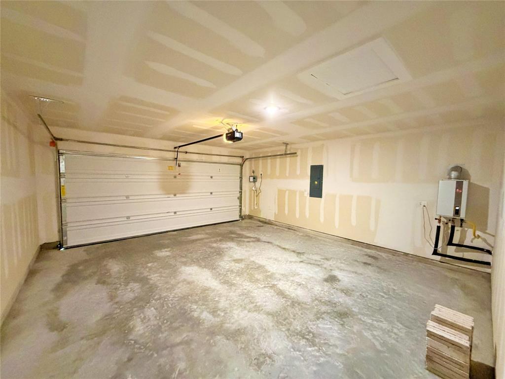 2203 Heatwave Lane Princeton, TX 75407 - Photo 25 of 32 a view of a garage