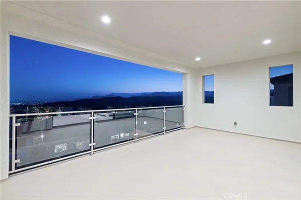 an empty room with a projector