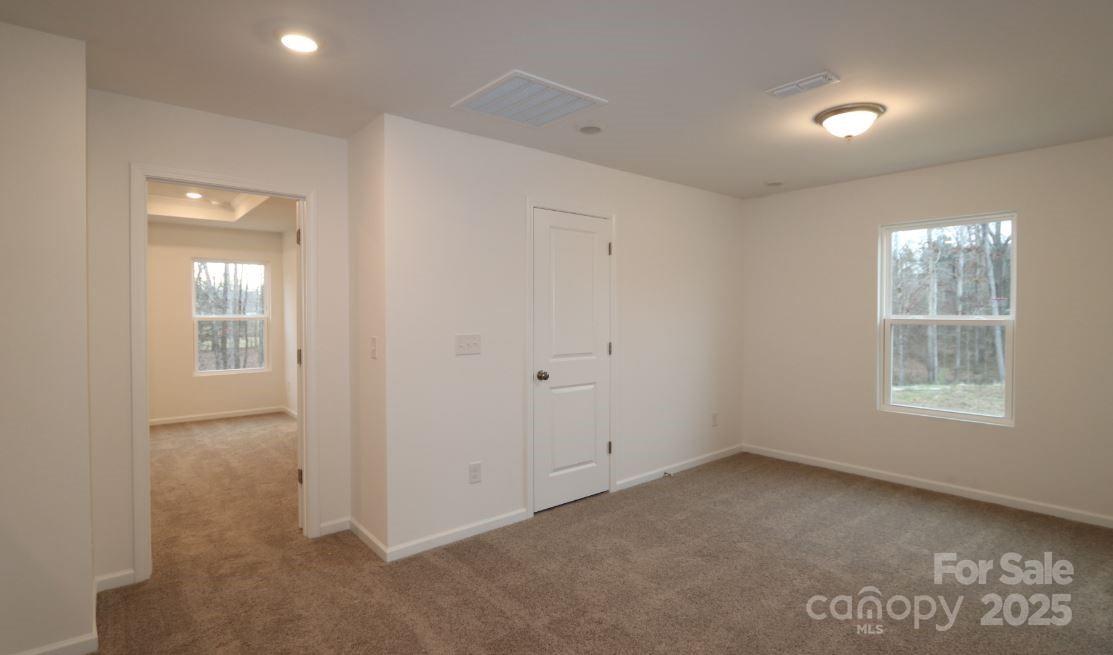 3540 Nimbell Road Monroe, NC 28110 - Photo 4 of 9 an empty room with windows