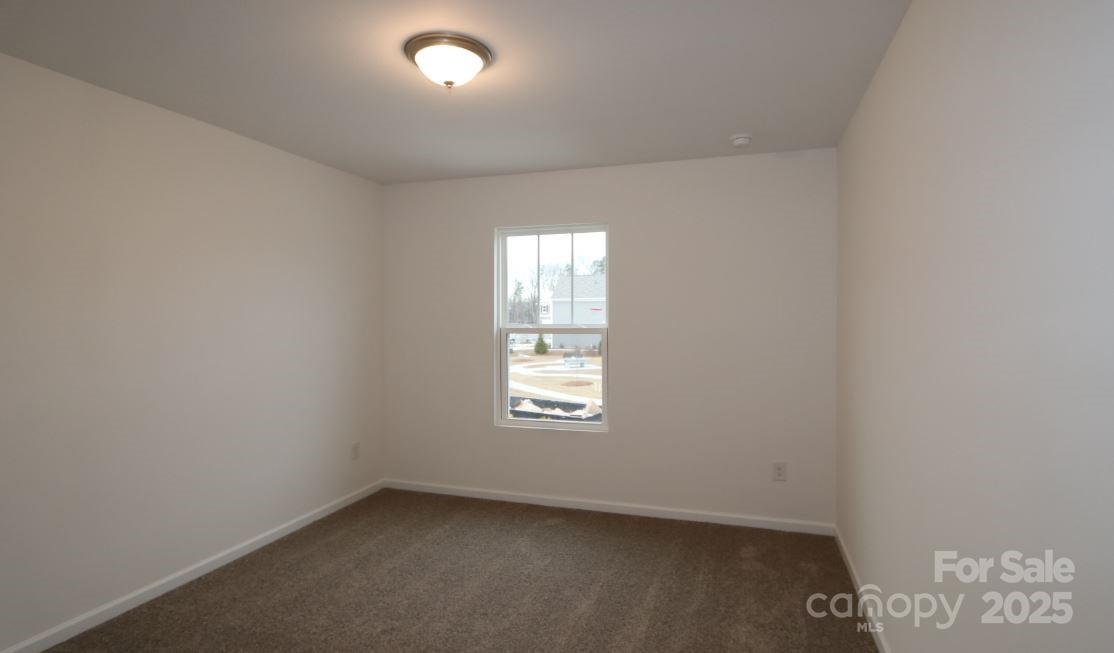 3540 Nimbell Road Monroe, NC 28110 - Photo 6 of 9 an empty room with windows