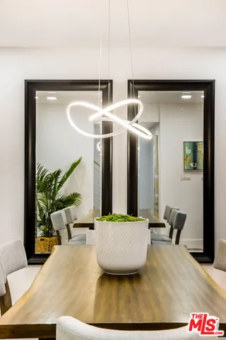 a view of a living room and entryway