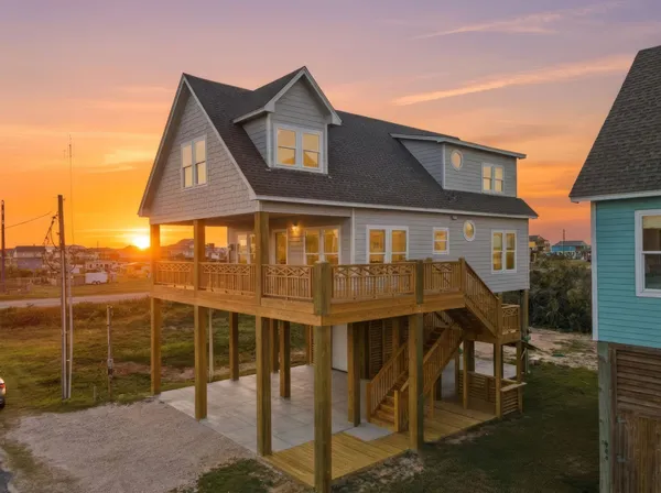 a front view of a house with a porch