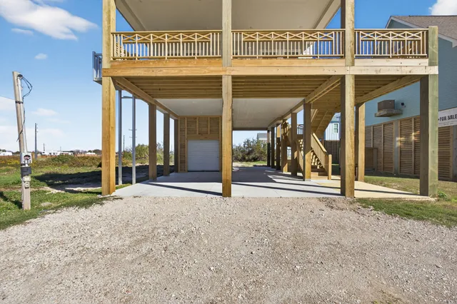 a view of a building with sitting area