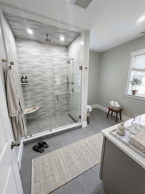 42 Parsons Street Newton, MA 02465 - Photo 20 of 36 a bathroom with a shower and a sink