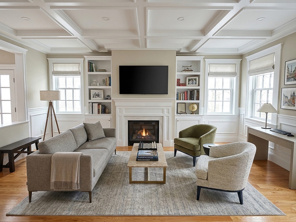 42 Parsons Street Newton, MA 02465 - Photo 2 of 36 a living room with furniture fireplace and flat screen tv