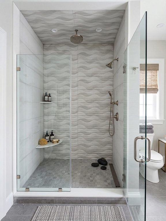 42 Parsons Street Newton, MA 02465 - Photo 21 of 36 a bathroom with a shower