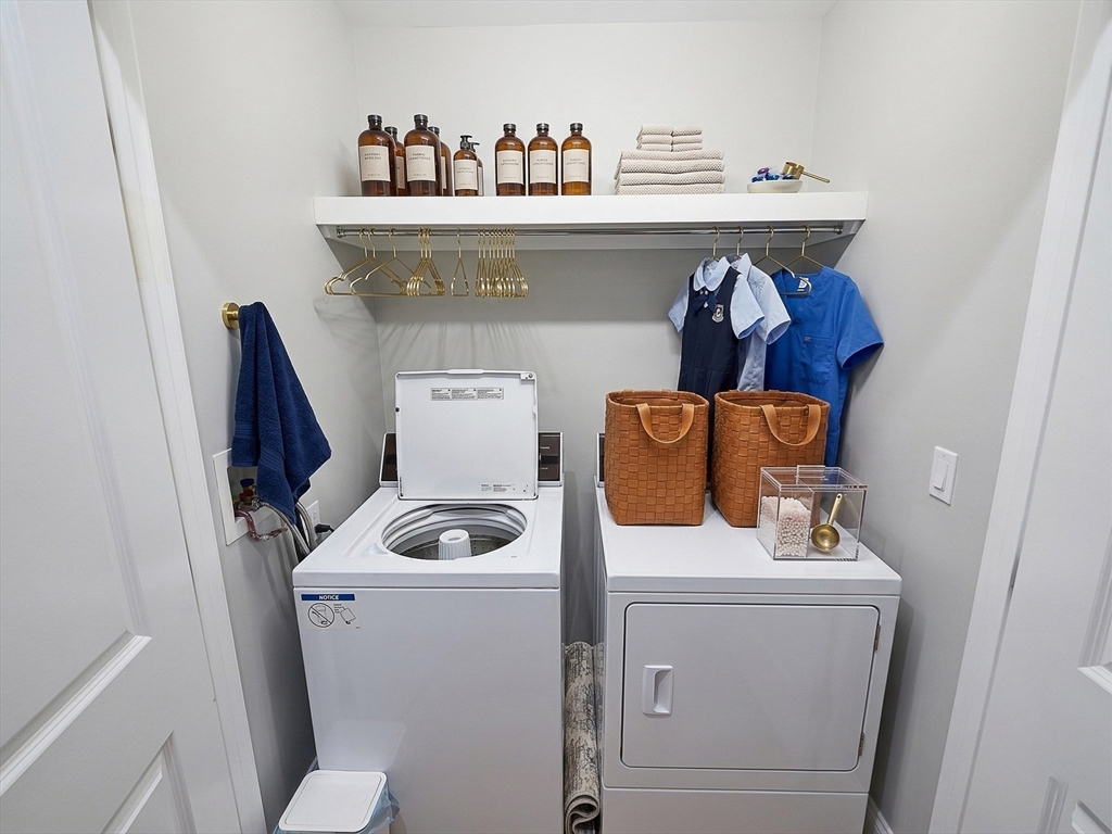 42 Parsons Street Newton, MA 02465 - Photo 24 of 36 a utility room with dryer and washer