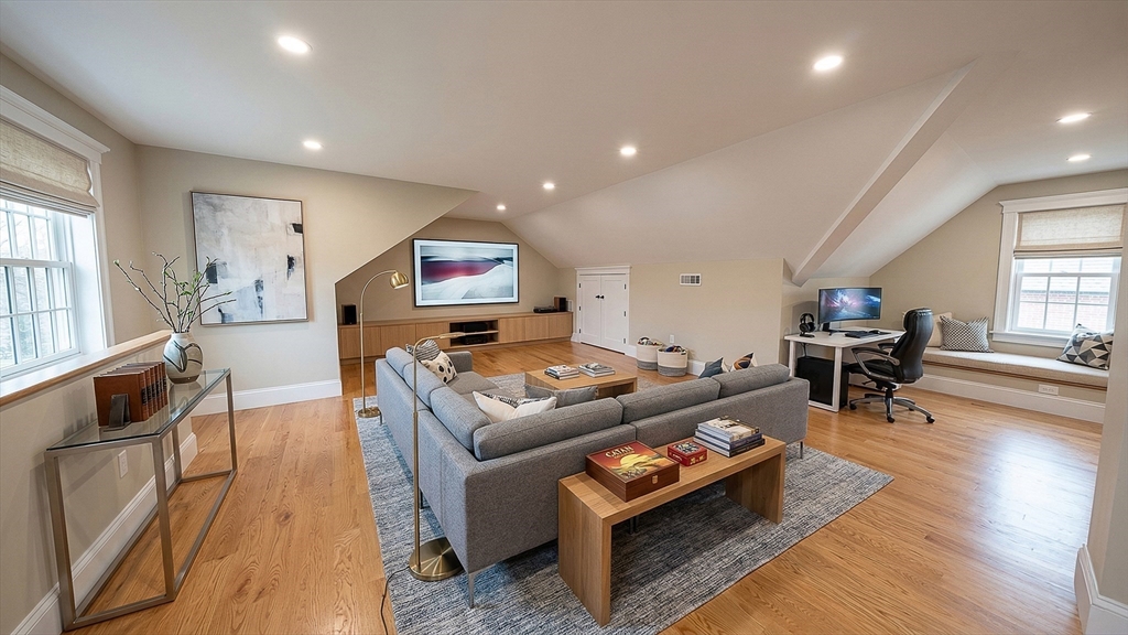 42 Parsons Street Newton, MA 02465 - Photo 30 of 36 a living room with furniture and a wooden floor
