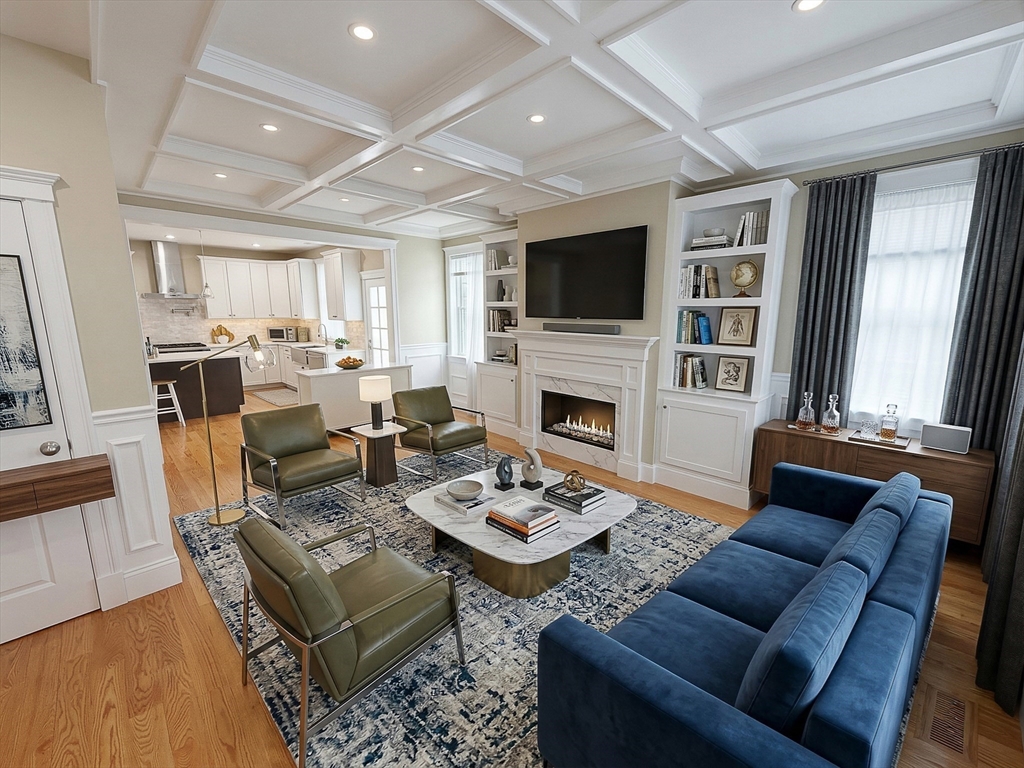 42 Parsons Street Newton, MA 02465 - Photo 3 of 36 a living room with furniture flat screen tv and a fireplace