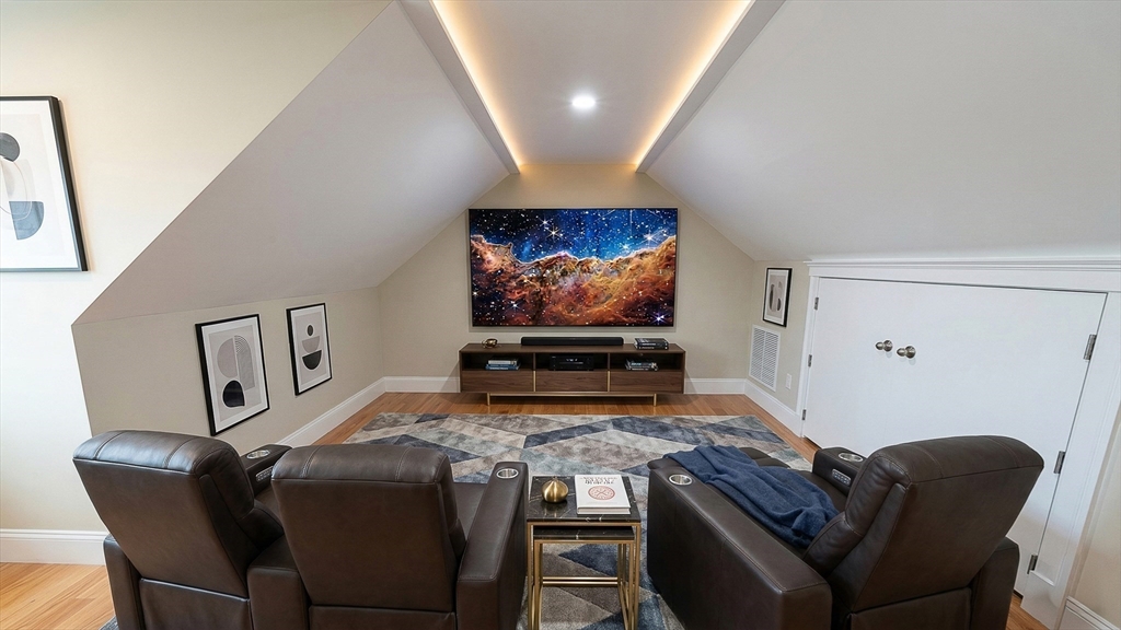 42 Parsons Street Newton, MA 02465 - Photo 31 of 36 a living room with furniture and a flat screen tv