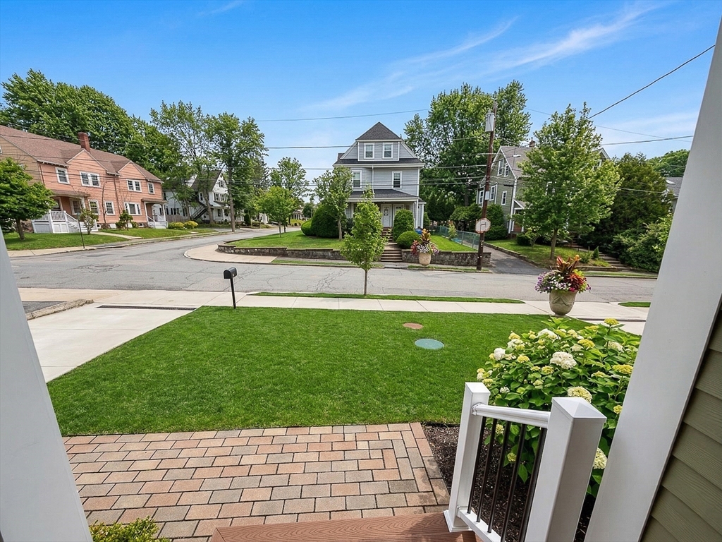 42 Parsons Street Newton, MA 02465 - Photo 33 of 36 a view of a swimming pool with a patio
