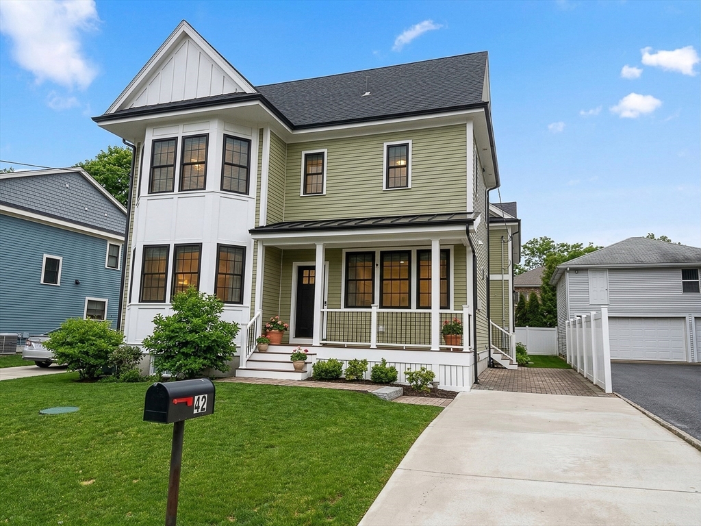 42 Parsons Street Newton, MA 02465 - Photo 36 of 36 a front view of a house with a yard