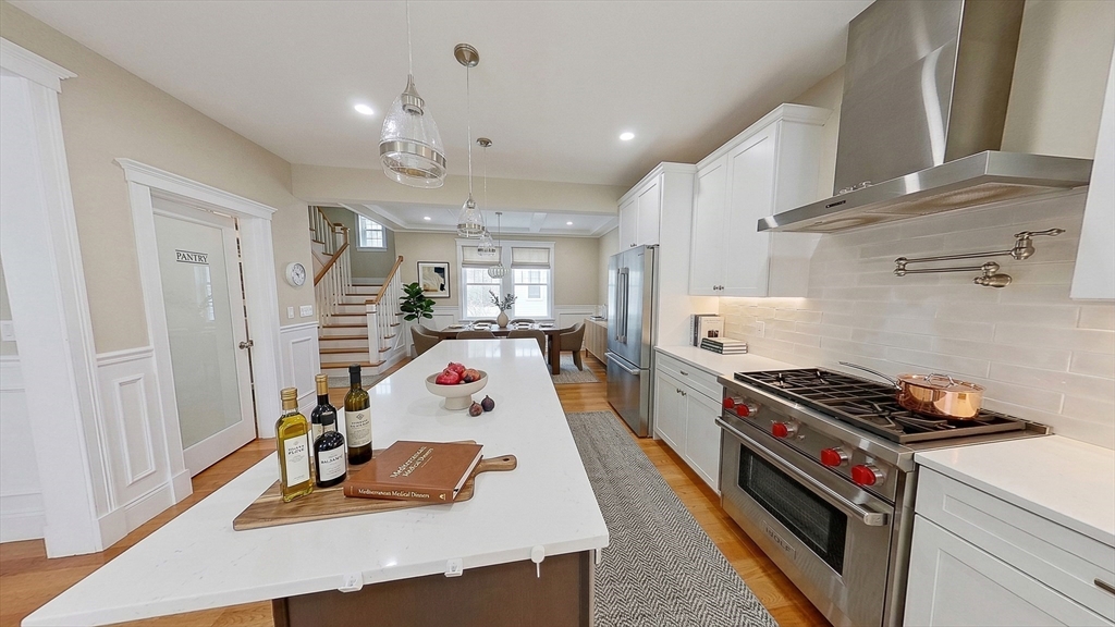 42 Parsons Street Newton, MA 02465 - Photo 8 of 36 a kitchen that has a lot of cabinets