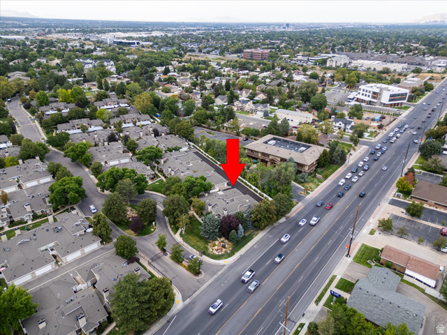 888 East 6895 South Midvale, UT 84047 - Photo 50 of 54 Bird’s-eye perspective of the well-maintained neighborhood featuring mature trees, organized layout, and close proximity to surrounding amenities.