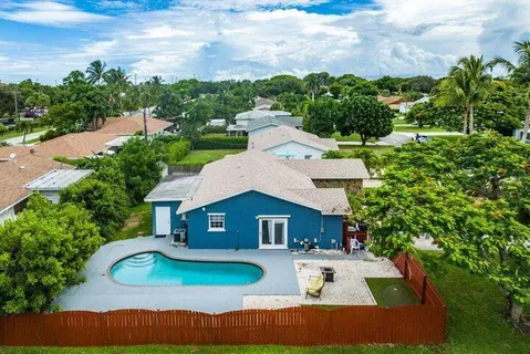 a backyard of a house with lots of green space