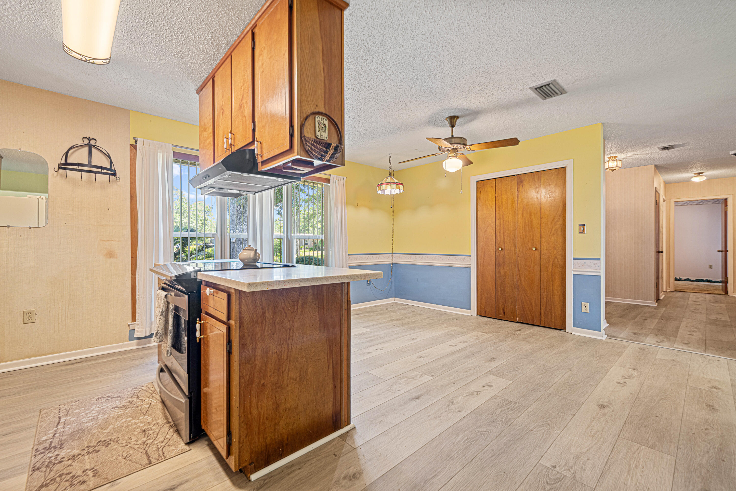 2744 Bay Grove Road Freeport, FL 32439 - Photo 13 of 45 a bathroom with a sink vanity and a mirror