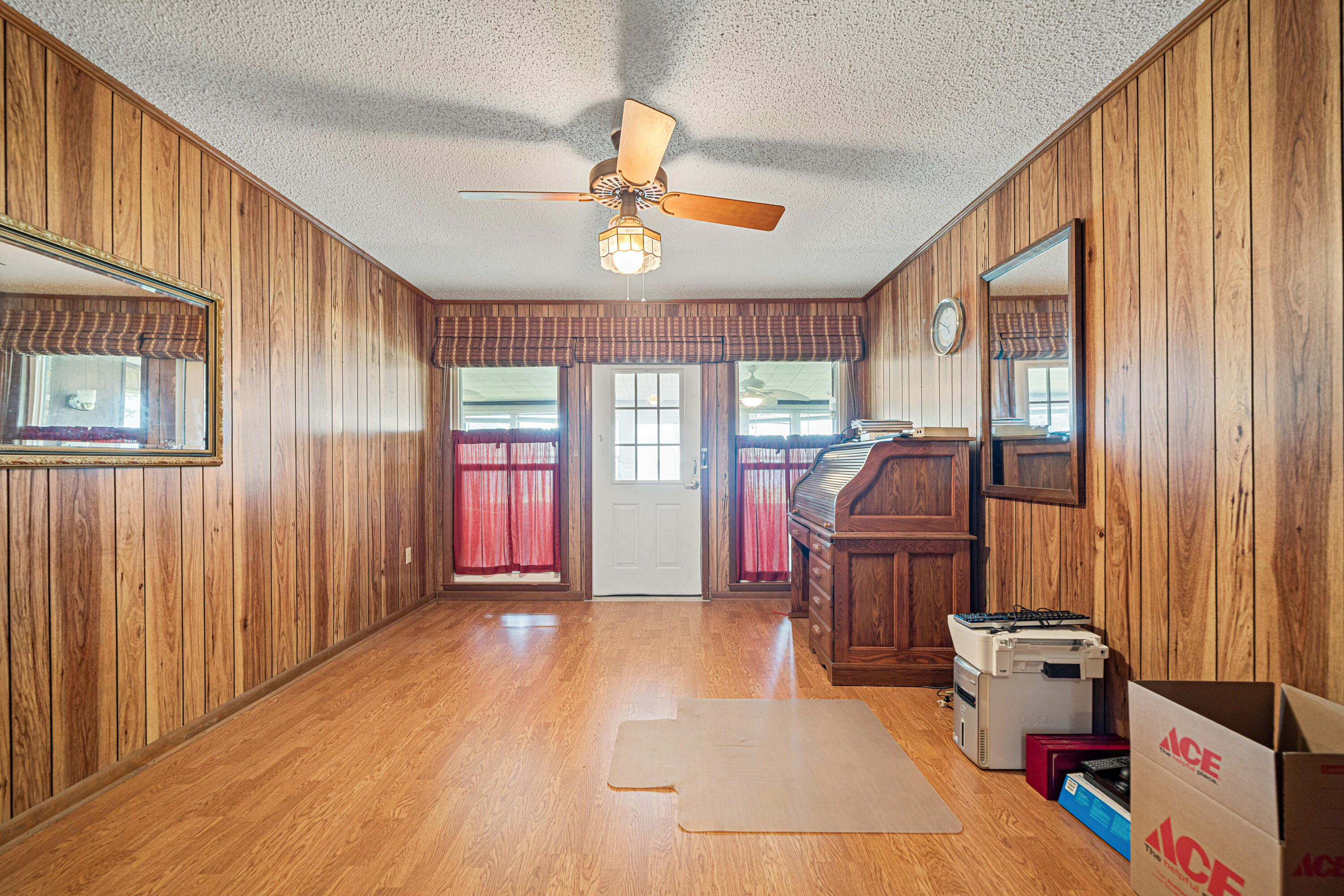 2744 Bay Grove Road Freeport, FL 32439 - Photo 17 of 45 wooden floor in an empty room with a window