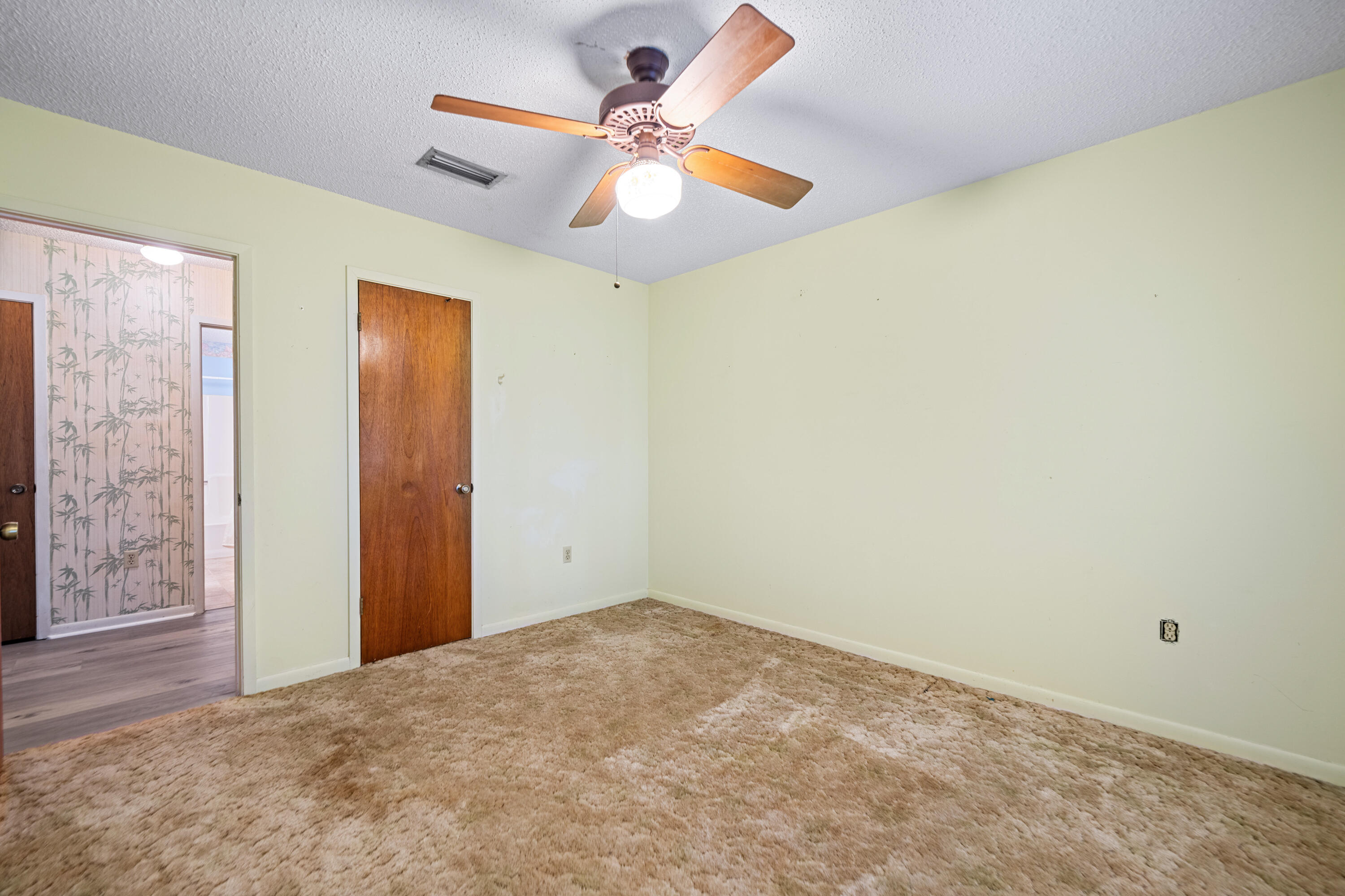 2744 Bay Grove Road Freeport, FL 32439 - Photo 25 of 45 a view of a big room with carpet