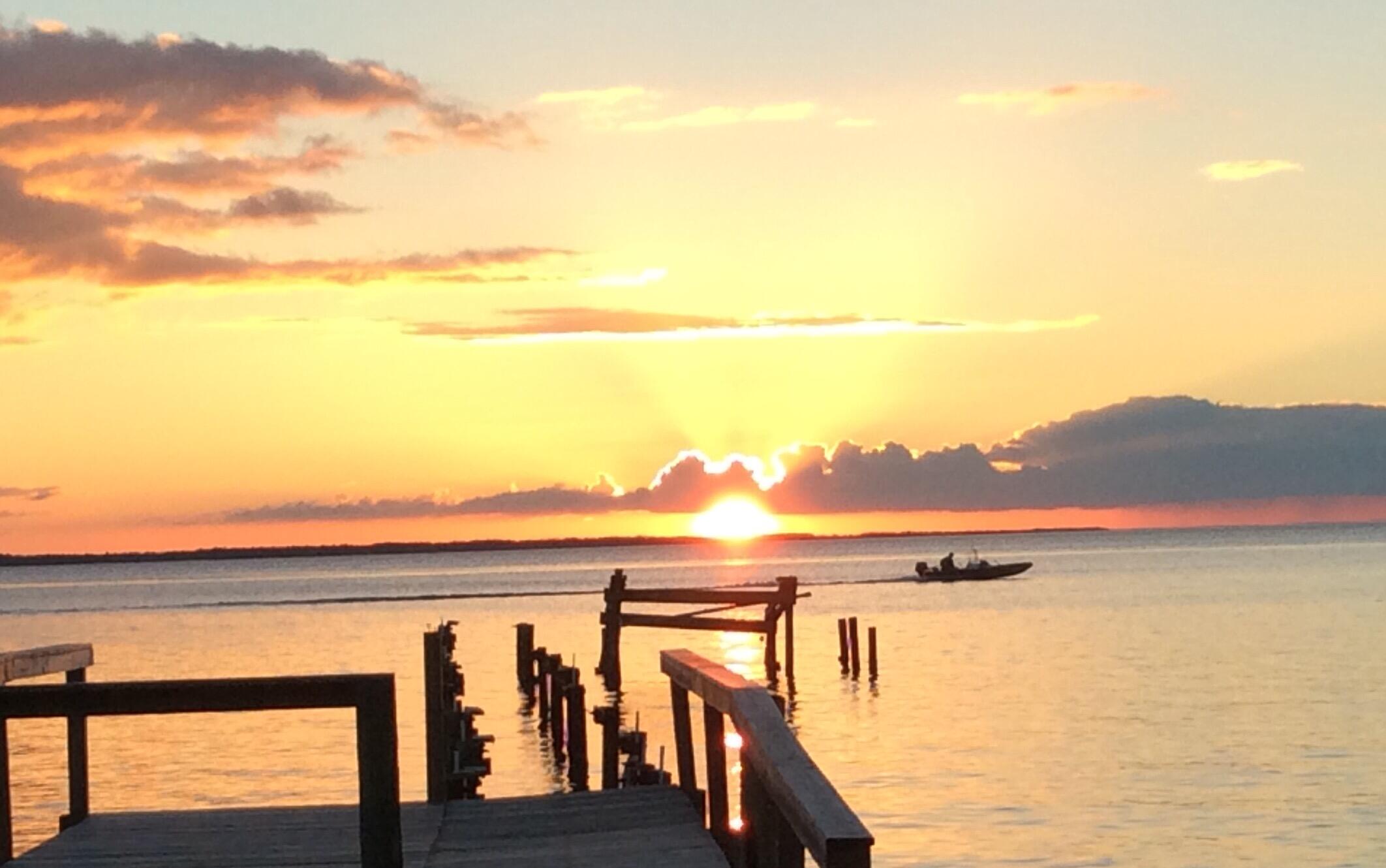2744 Bay Grove Road Freeport, FL 32439 - Photo 43 of 45 a view of ocean with sunset