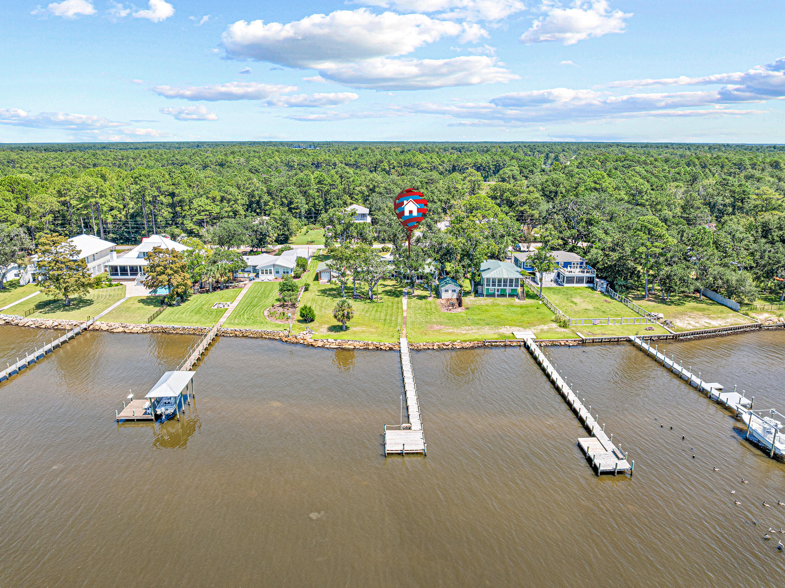 2744 Bay Grove Road Freeport, FL 32439 - Photo 8 of 45 a view of a swimming pool and an outdoor seating
