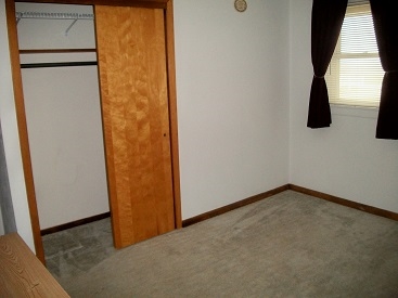 9732 East Ridott Road Pecatonica, IL 61063 - Photo 16 of 20 a view of a storage & utility room with a door