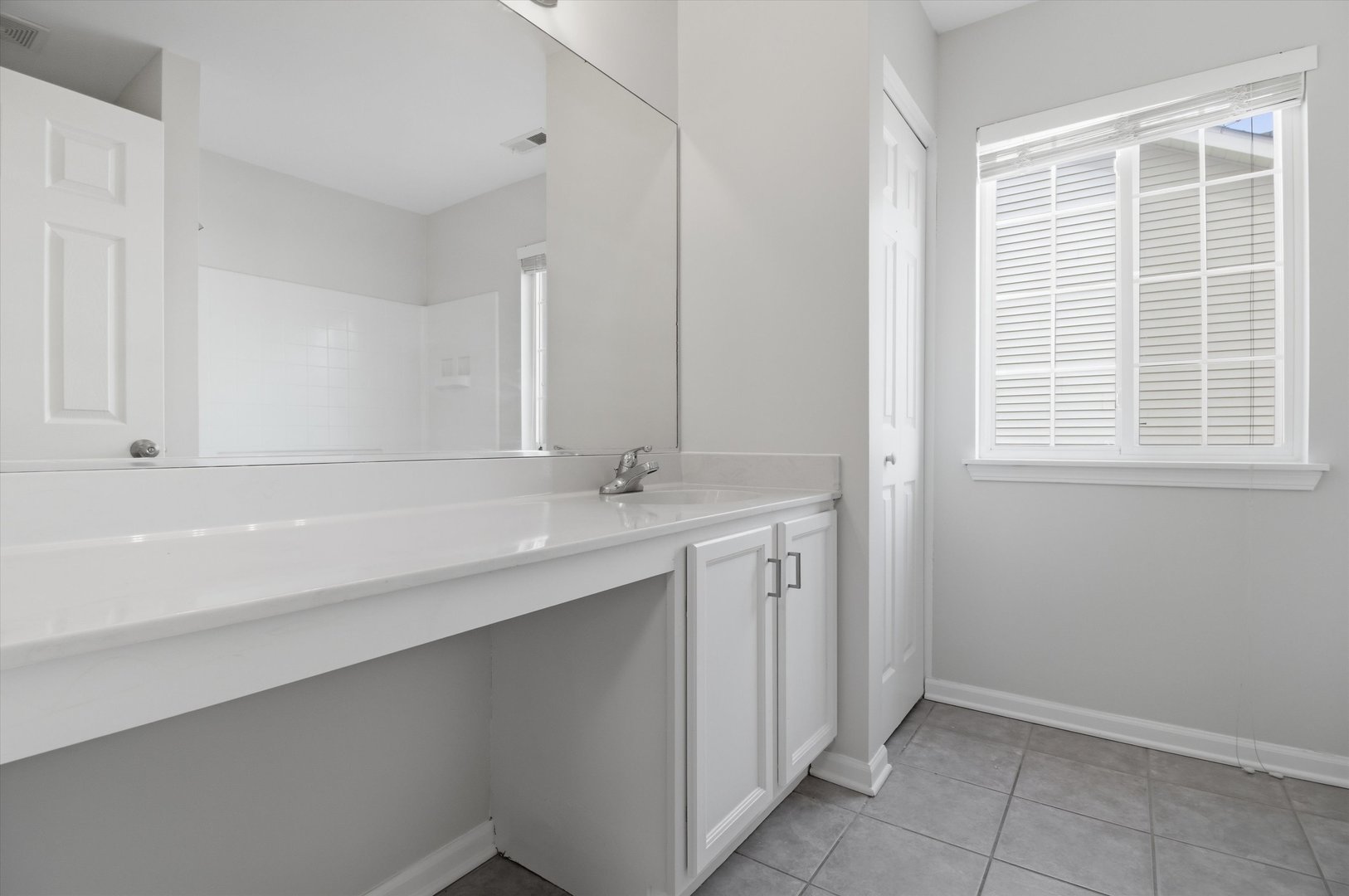 2511 Hennig Road Hampshire, IL 60140 - Photo 13 of 44 a bathroom with a sink and a mirror