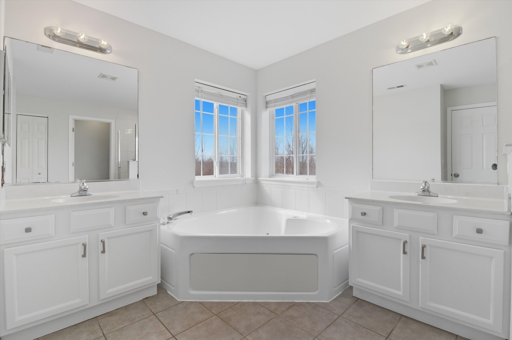 2511 Hennig Road Hampshire, IL 60140 - Photo 15 of 44 a bathroom with a sink double vanity and a mirror