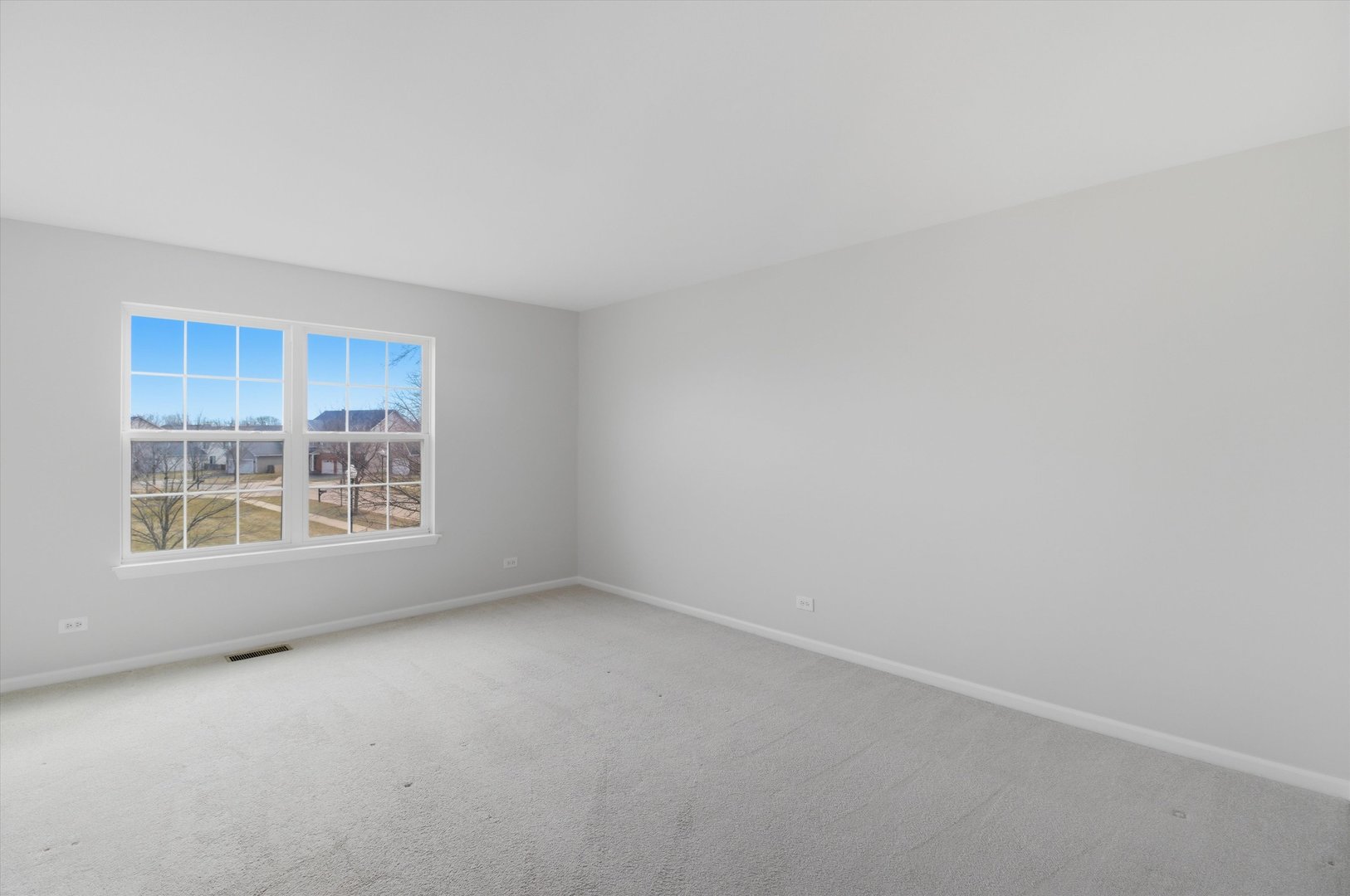 2511 Hennig Road Hampshire, IL 60140 - Photo 22 of 44 a view of an empty room with a window